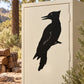 Black woodpecker turning-head silhouette decal for doors or windows