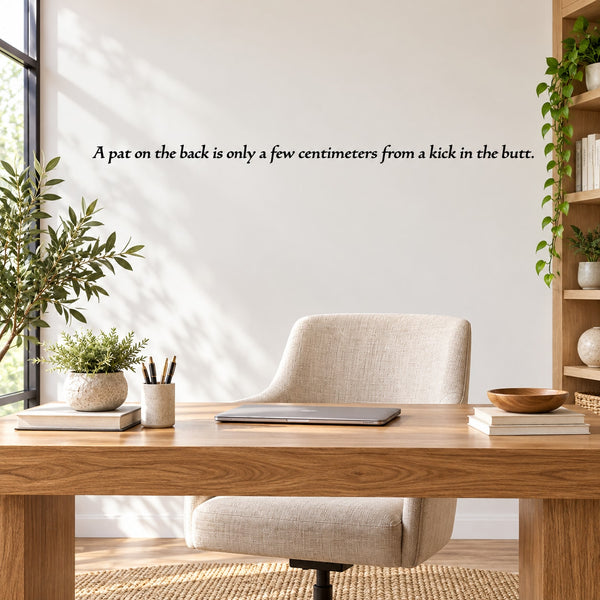 Wall decal with motivational quote text: "A pat on the back..."