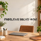 Wall quote decal: 'PROBLEMS SOLVED HERE' in colorful lettering