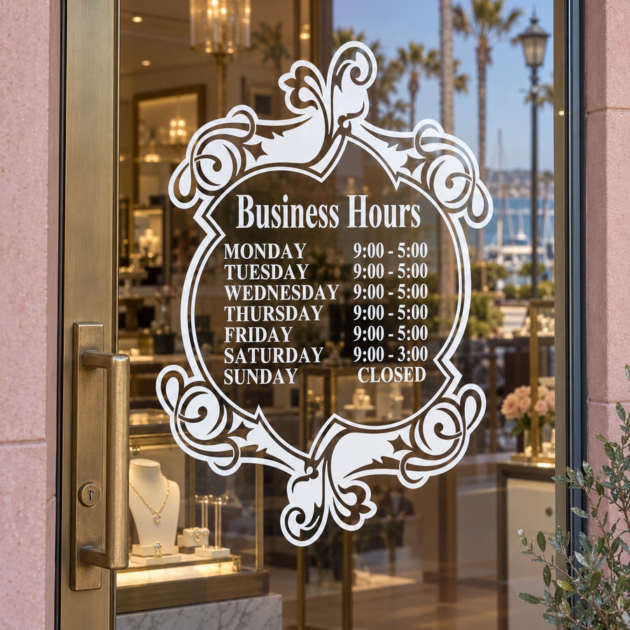 Calligraphic business hours decal with ornate white flourishes and store hours text