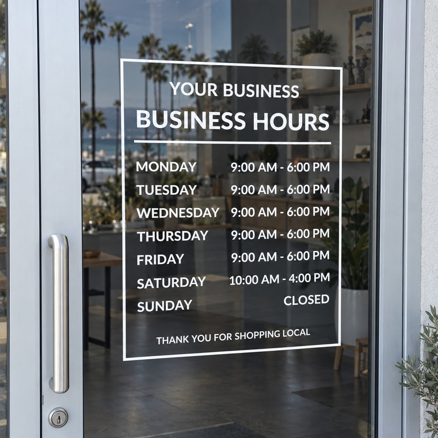 Framed business hours decal with white text and hours for Monday–Sunday on glass