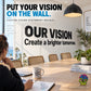 Wall decal text: 'OUR VISION' and 'Create a brighter tomorrow'.