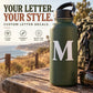 Capital letter “M” vinyl decal applied to a dark green water bottle