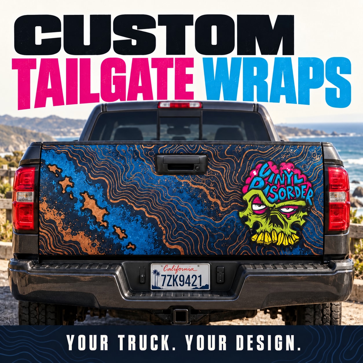 Custom tailgate skin with blue-orange graphic and skull face design on truck rear
