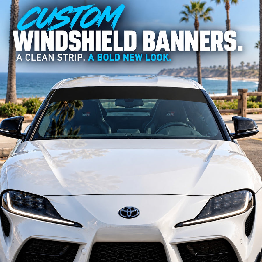 Windshield banner decal kit with clear strip across a car windshield