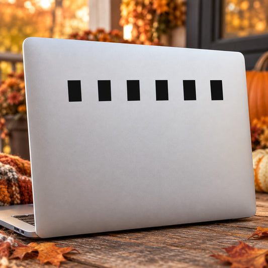Vinyl decal sheet displaying multiple black rectangular bars arranged in a row.