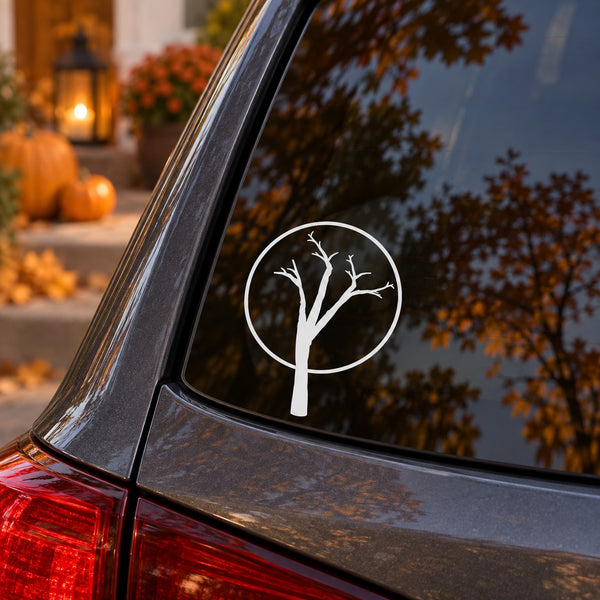 Halloween vinyl tree decal in white circle on glass, split branches