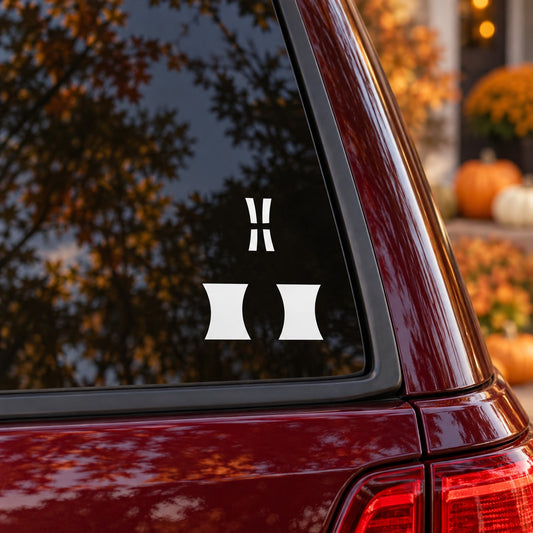 Halloween window vinyl decal with black cross and hourglass symbols on glass