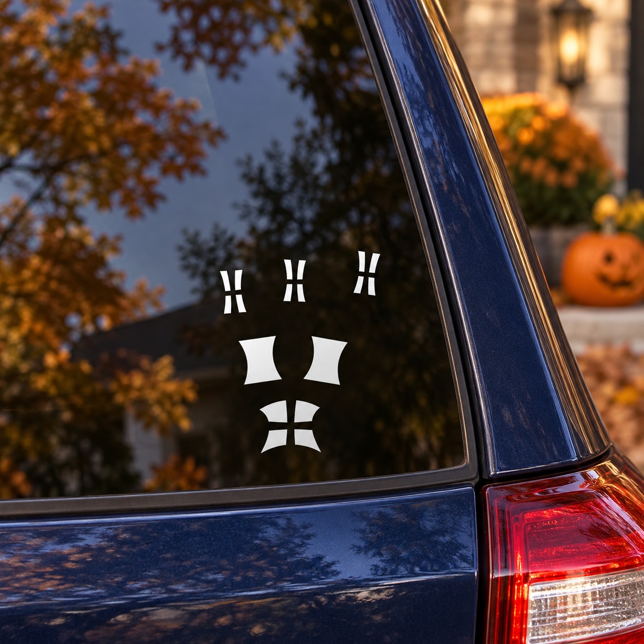 Halloween window vinyl decal on window glass with four arched pane shapes