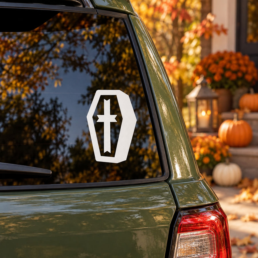 Coffin-shaped cross decal, white outline with black cross icon