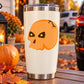 Halloween skull decal on white stainless tumbler, orange cracked skull face design