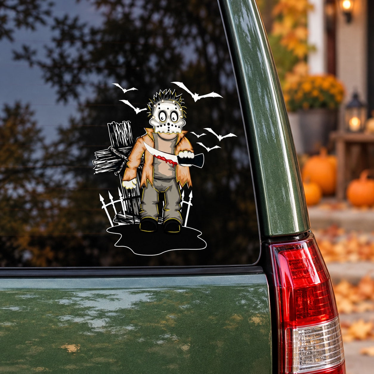 Horror character wall decal with bats and coffin-like details, shown on a window