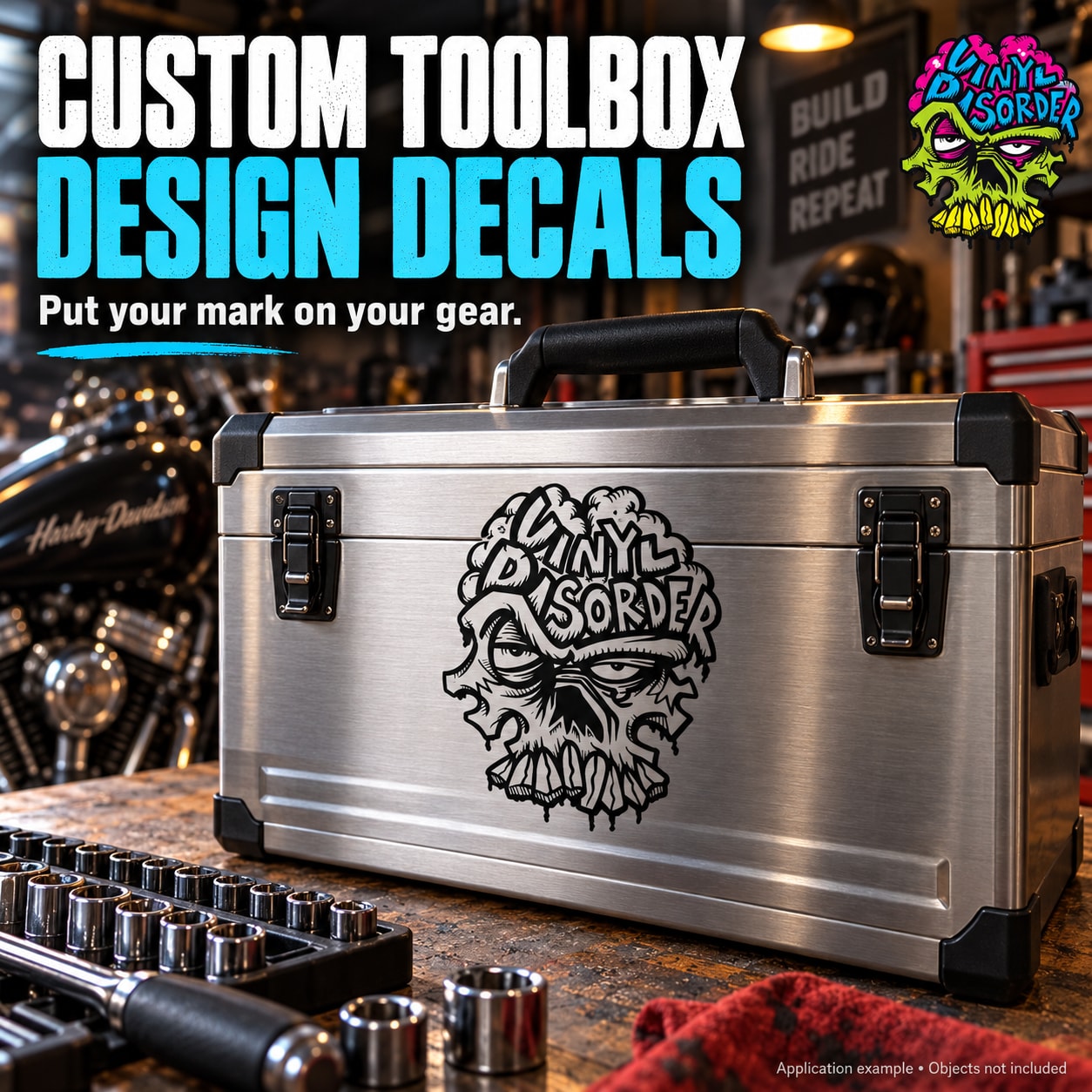 Silver metal toolbox with handle and front Vinyl Disorder decal, black latches