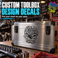 Silver metal toolbox with handle and front Vinyl Disorder decal, black latches