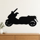 Side-view scooter decal in black on a light background