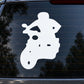 White scooter rider decal silhouette on a car window