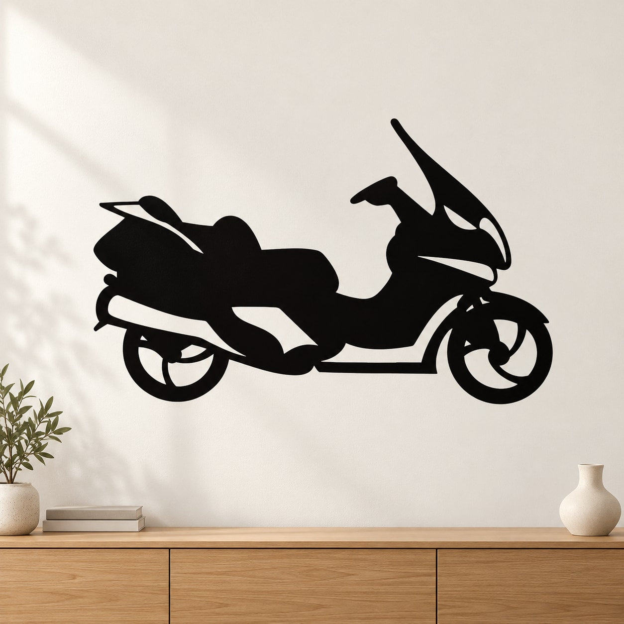 Black side-view scooter decal sticker with detailed wheels and handlebars