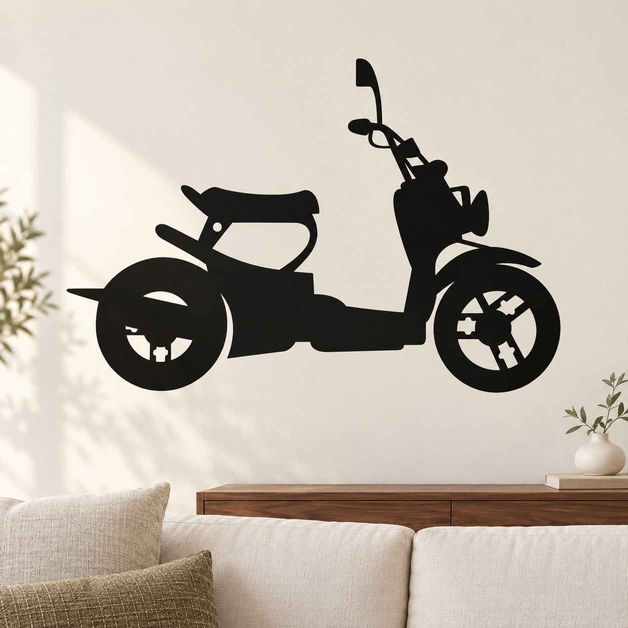 Black little scooter vinyl decal, side profile riding pose.