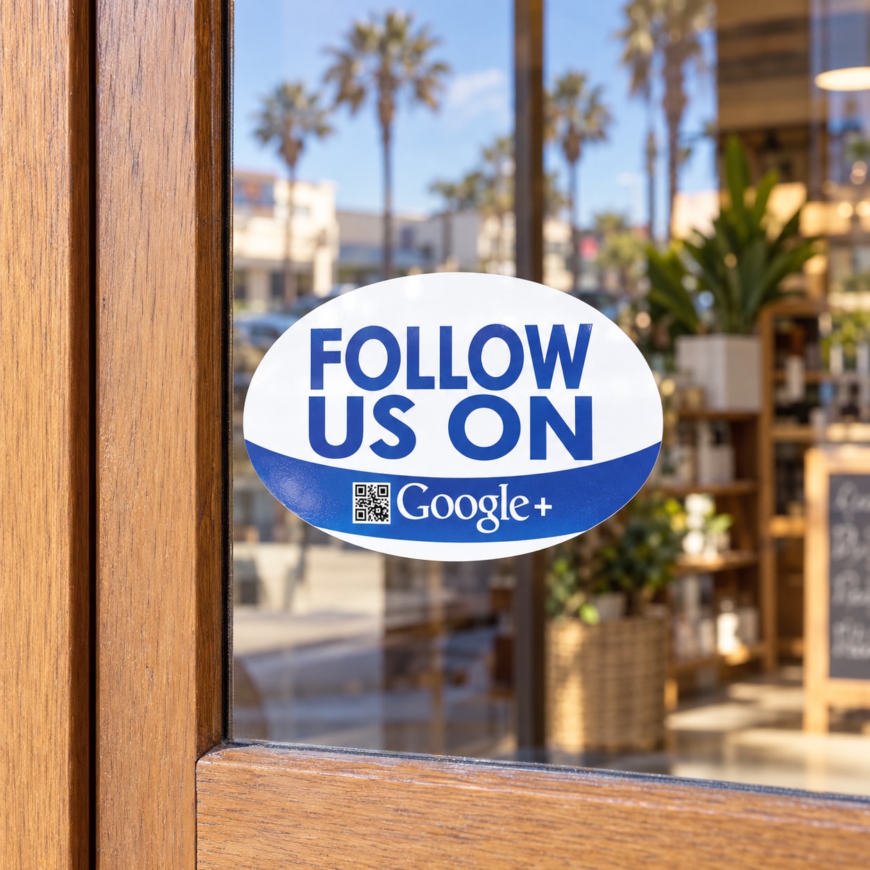 Oval white vinyl sticker: blue FOLLOW US ON Google+ logo