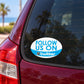 Round vinyl car sticker reading "FOLLOW US ON Twitter" on rear window