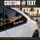White @coastalcrew vinyl decal on car window