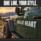 Vinyl text decal: 'WILD AT HEART' on dark green vehicle door