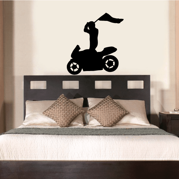 Motorcycle racer decal with black rider silhouette on a scooter-style bike