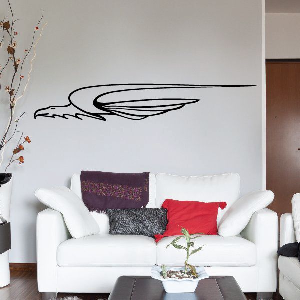 Black pinstripe vinyl vehicle decal with swooping wing graphic on a wall surface