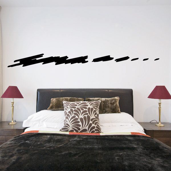 Vehicle pinstripe vinyl decal with black solid and dashed stripe on wall