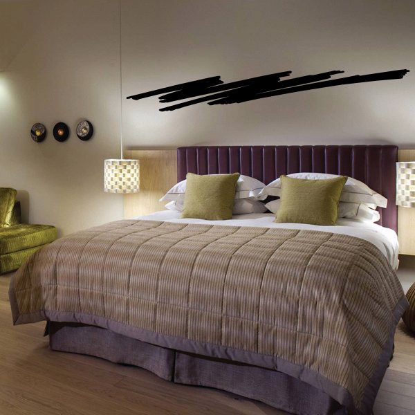 Black pinstripe vinyl wall decal, long horizontal stripe design above bed