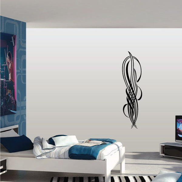 Black pinstripe vinyl decal with swirling flame-like tribal emblem for vehicles