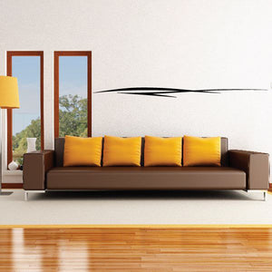 Vehicle pinstripe vinyl decal, long black stripe across a wall surface