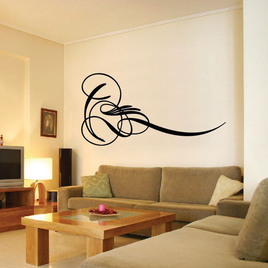 Black pinstripe vinyl swirl decal on a wall, curved scroll design
