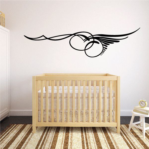 Vehicle pinstripe vinyl decal with winged circle and curved lines, black