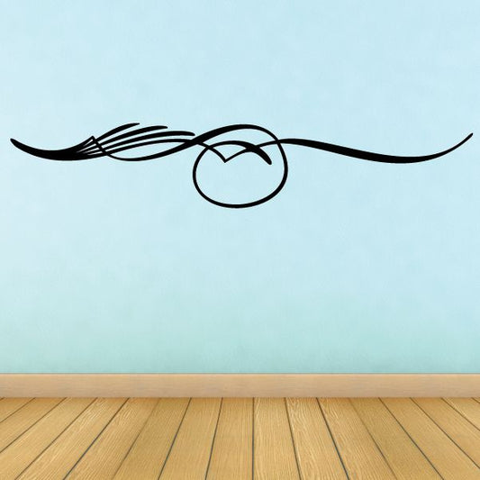 Pinstripe vinyl decal with black curvy lines and centered round emblem