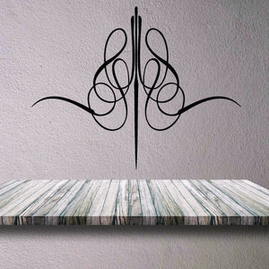 Black decorative pinstripe vinyl decal with vertical scroll-style emblem
