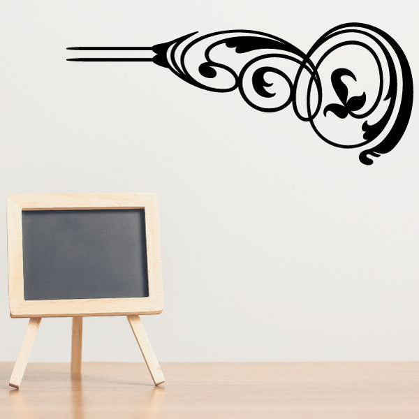Vinyl pinstripe vehicle decal with black swirling swirl and curved scroll pattern