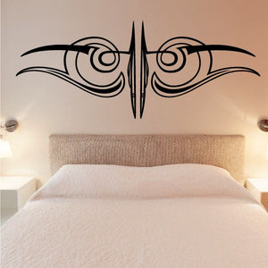 Black vehicle pinstripe vinyl decal with tribal wing design for wall