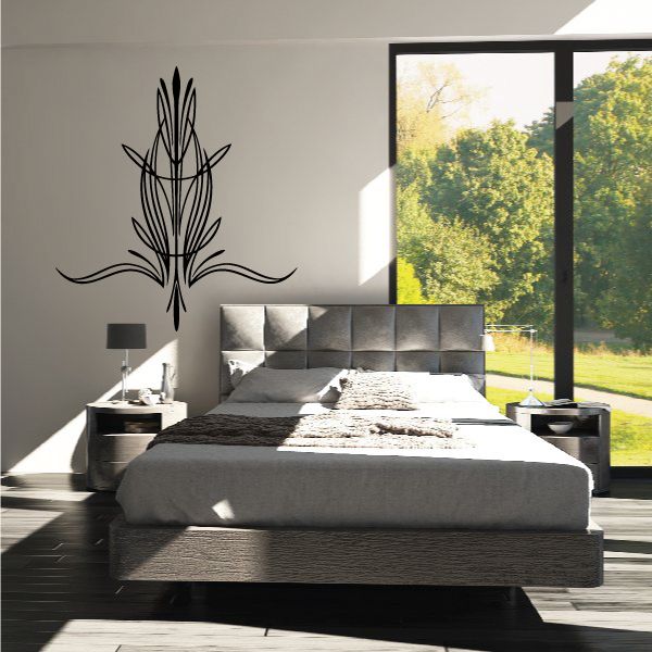 Black pinstripe vinyl decal graphic with tall feather-like line design on wall
