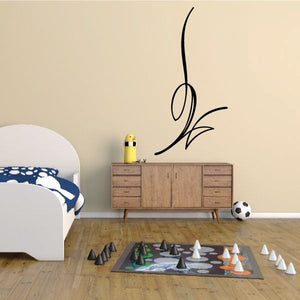 Black pinstripe vinyl decal with swooping flame-like outline on wall