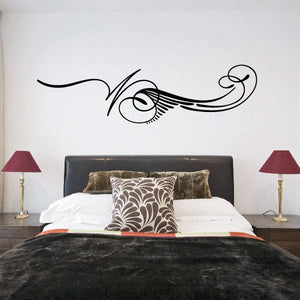 Black pinstripe vinyl car decal with swirl and decorative lines on wall