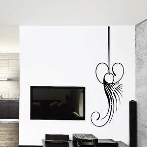 Black pinstripe vinyl wall decal with swirling filigree and dotted lines