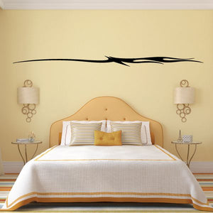 Black vehicle pinstripe vinyl decal with winged stripe design above bed