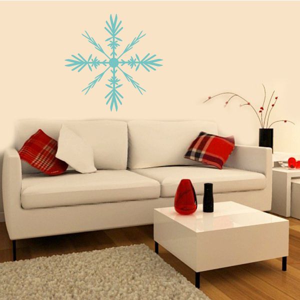 Light blue snowflake wall decal with layered arms and center dot