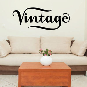 Vinyl wall decal with large black 'Vintage' script lettering