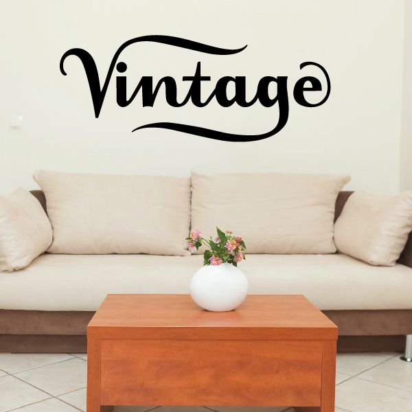 Vinyl wall decal with large black 'Vintage' script lettering