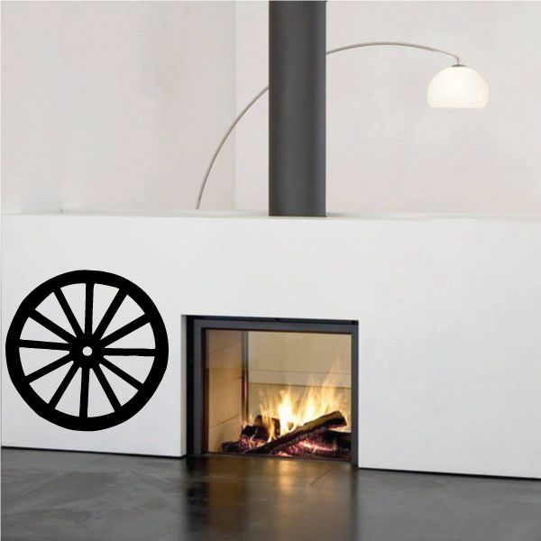 Black wagon wheel wall decal with spokes and center hub