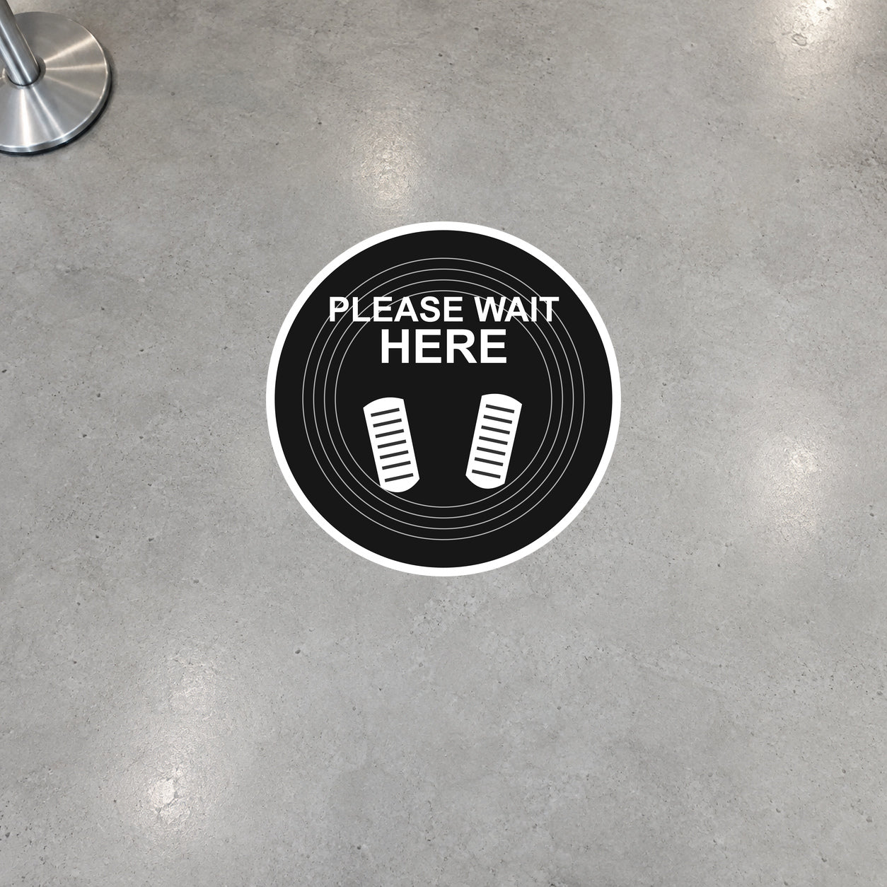 12-inch round floor sticker reading “PLEASE WAIT HERE” with white icon