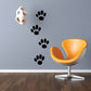 Cat paw print track wall decal with multiple black paw prints