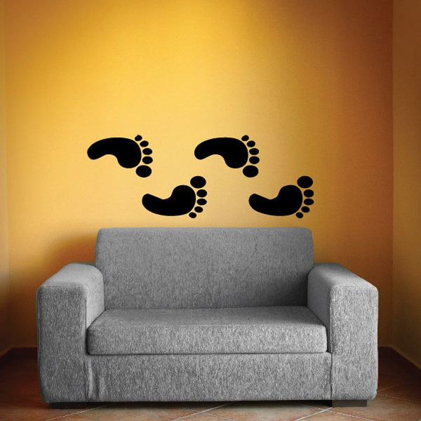 Black footprint wall decal with two pairs of foot print icons
